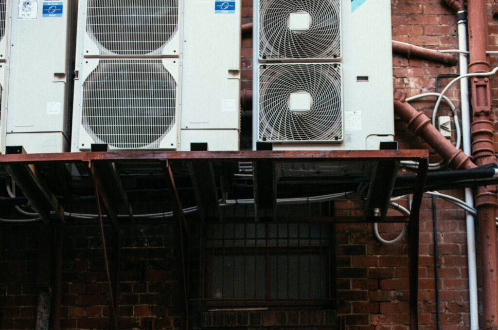 air source heat pumps on outside wall